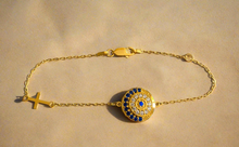 Blue sparkly eye bracelet.