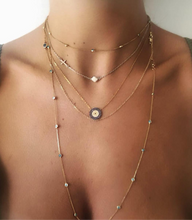 A Layered Gold mati necklace combination