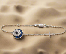 Blue sparkly eye bracelet.