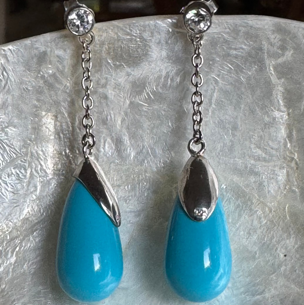 Christina rhodium turquoise C.Z. Stud chain drop earrings.
