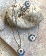 Blue sparkly eye bracelet.