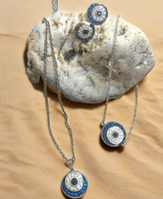 Blue mati eye sparkly earrings