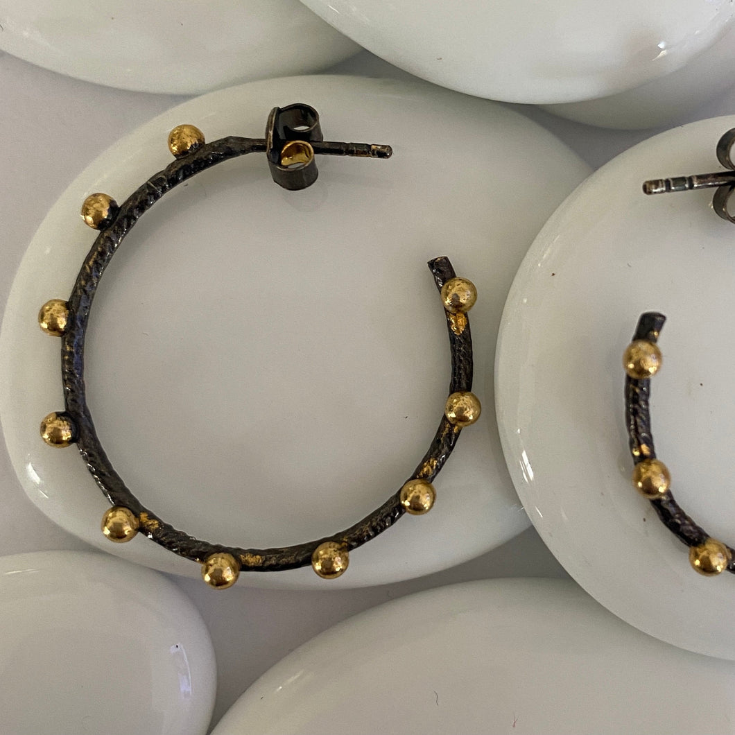 ‘Anna’ black oxidised hoop studs with yellow gold beads.