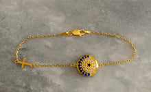 Blue sparkly eye bracelet.