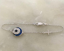 Blue sparkly eye bracelet.