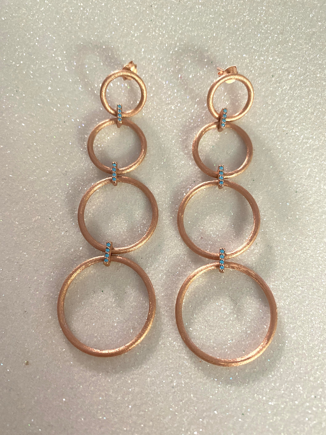4 Brushed Silver Linked Hoops earrings