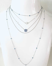 A Layered Gold mati necklace combination