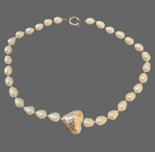 Pearl choker with hammered heart