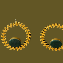 The golden olive wreath green quartz earrings.