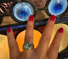 Dome shaped blue topaz ring