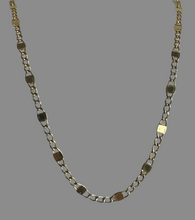 The 14k solid gold flat curb and  squares chain.