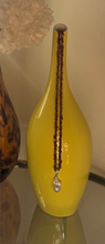 Calcite and baroque pearl