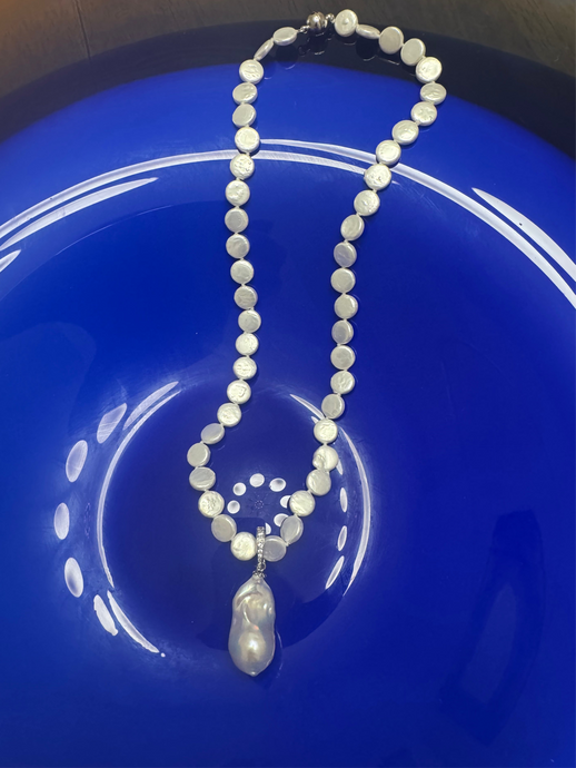 The coin necklace and the baroque fresh water pearl pendant
