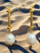 Ionic columns with fresh water pearl drop earrings.