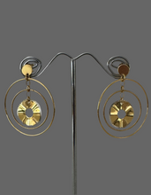 Three interlocking polished hoop earrings