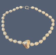 Pearl choker with hammered heart