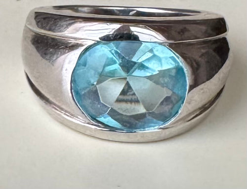 Dome shaped blue topaz ring