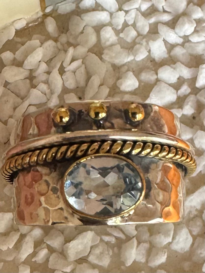 Blue topaz love ring