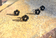 Black enamel flower studs