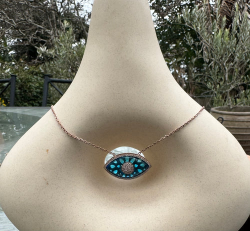 Blue enamel large eye necklace