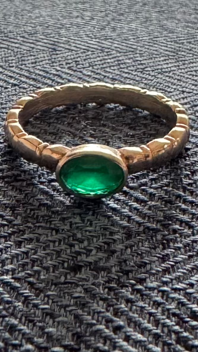 Green and silver ring
