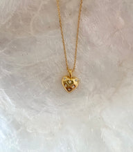 The petite sparkly gold heart