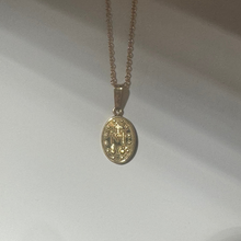 Miraculous coin necklace