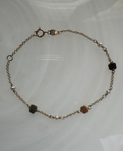 14k gold Akoya pearls and discs bracelet.