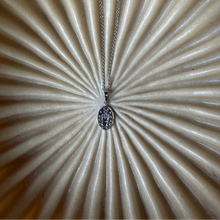 Miraculous coin necklace