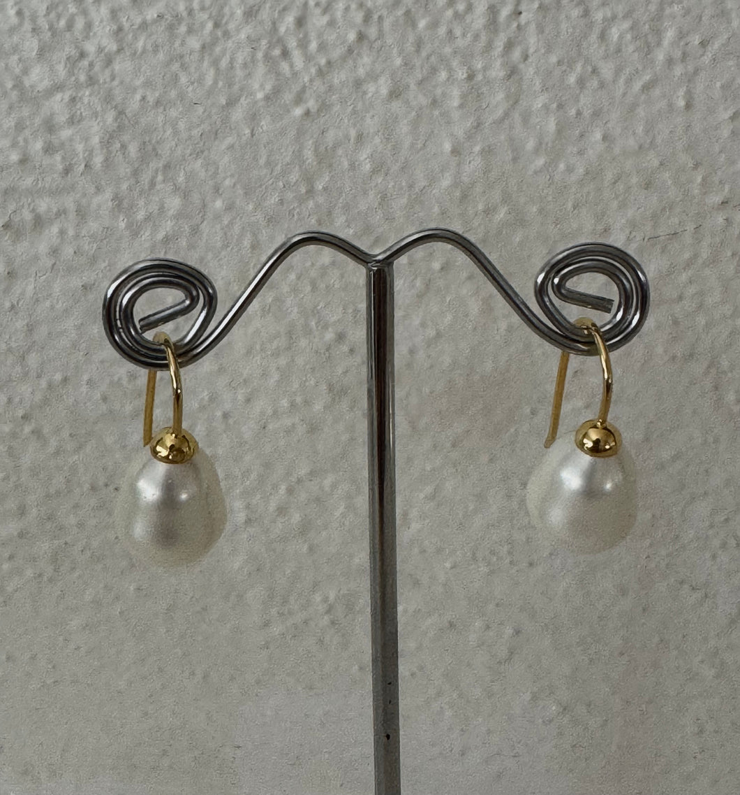 Spanish Baroque drop earrings on gold vermeil hooks.