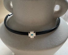 The leather unisex block cross bracelet.