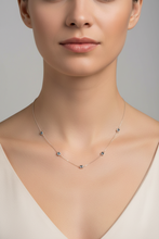 9k gold blue topaz emerald cut necklace