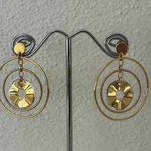 Three interlocking polished hoop earrings