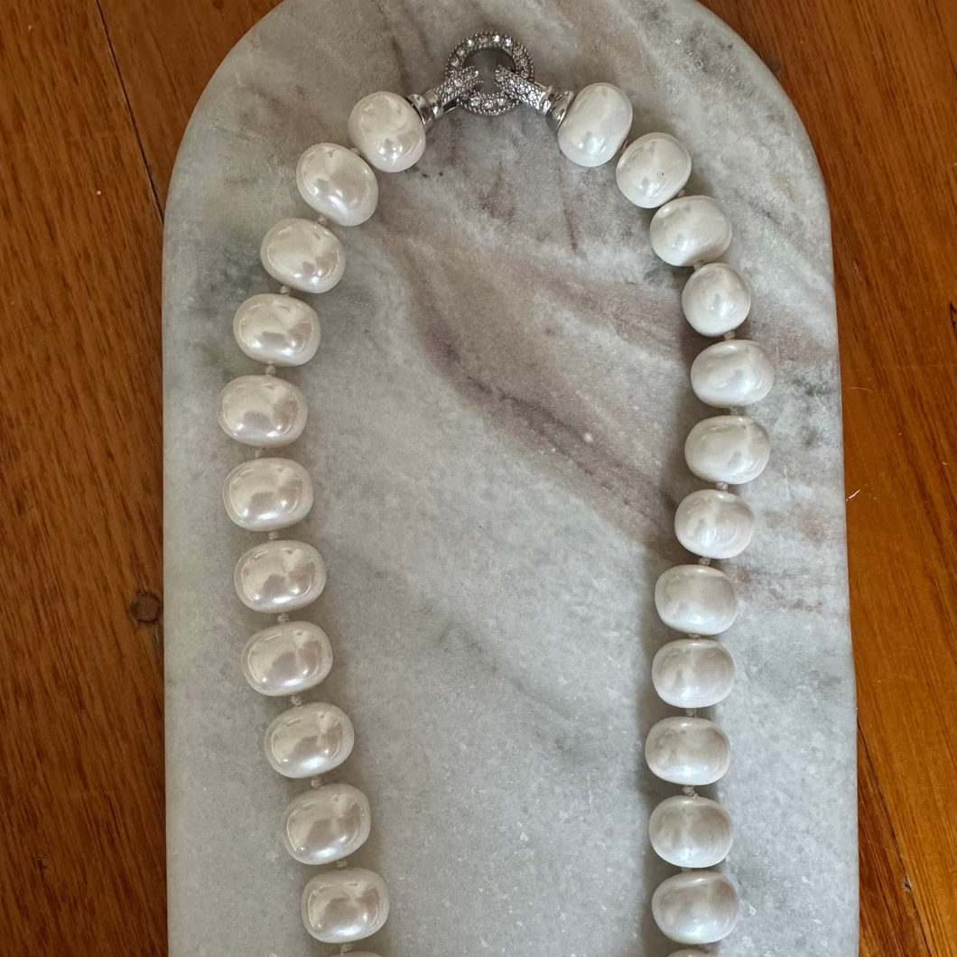 Shell based pearl necklace