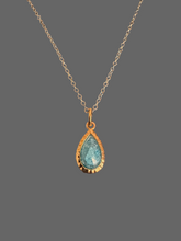 The blue quartz marquise drop