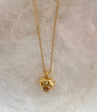 The petite sparkly gold heart