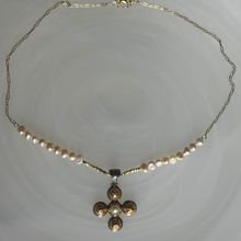 The gold filigree Byzantine fresh water pearl cross