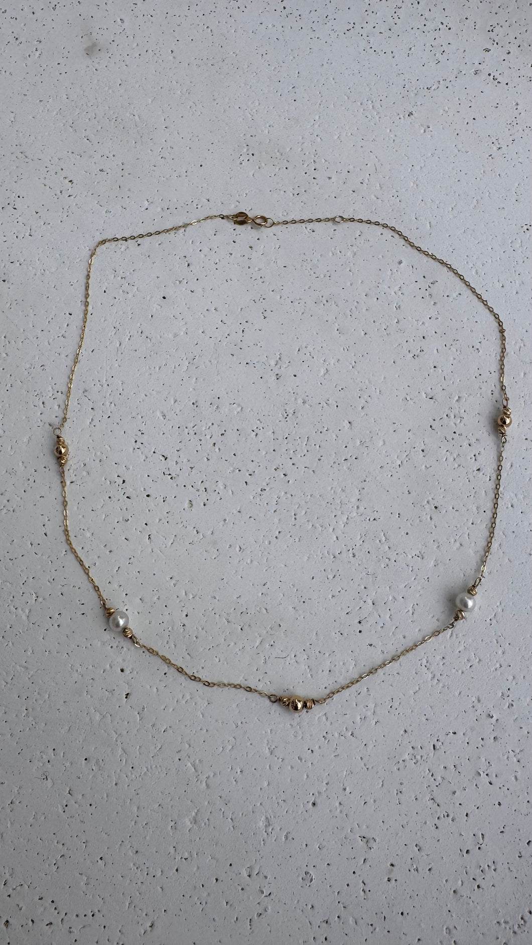 Solid Gold necklace with seven Akoya pearls