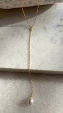 Single pearl lariat necklace