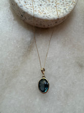 The London blue oval 9k solid gold pendant