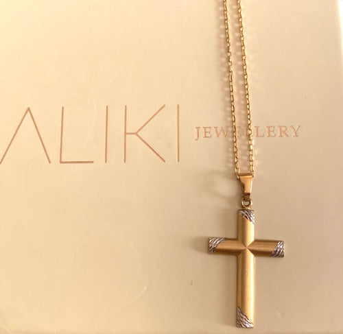 9k Matte yellow gold and white gold cross