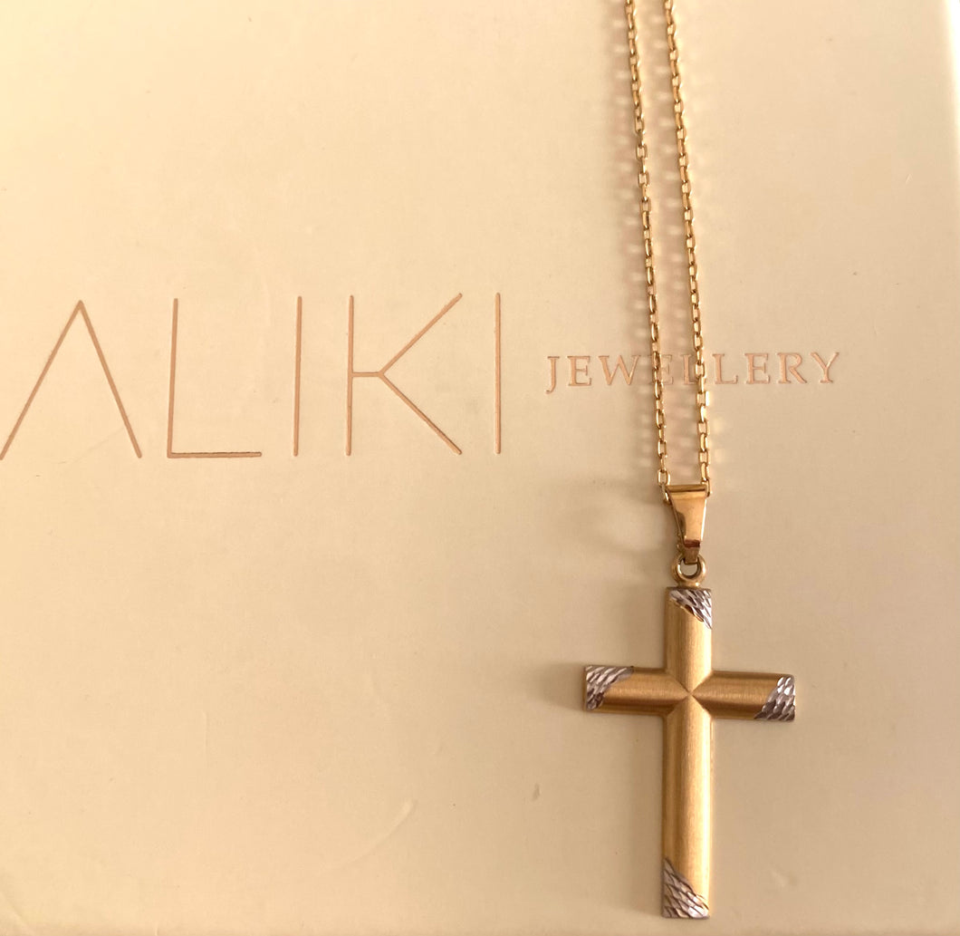 9k Matte yellow gold and white gold cross