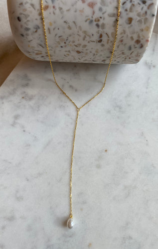 Single pearl lariat necklace