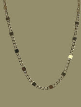 The 14k solid gold flat curb and  squares chain.