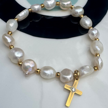 The blue quartz and fresh water pearl bracelets with cross.