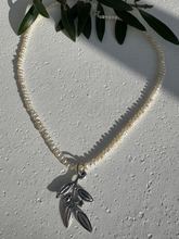 The tiniest seed pearl necklace