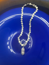 The coin necklace and the baroque fresh water pearl pendant
