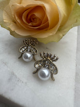 Melibee shell pearl studs.