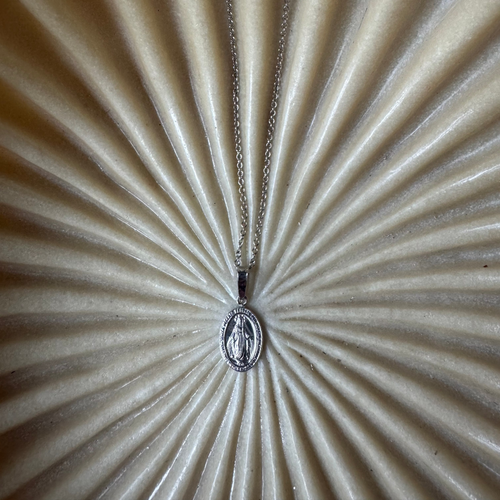 Miraculous coin necklace