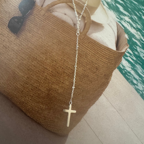 The fine ball necklace with hanging cross